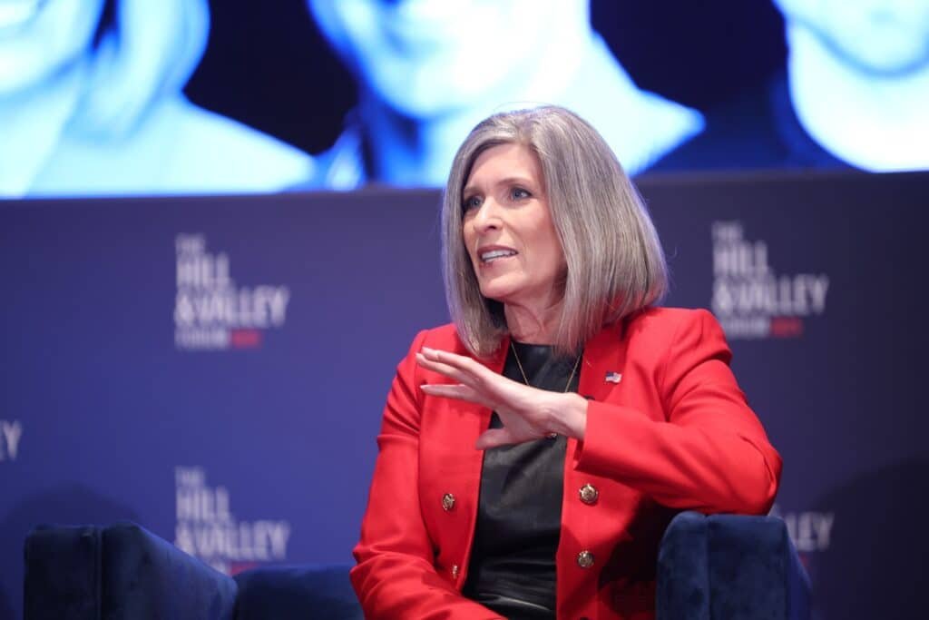 Republican senator Ernst faces boos in the contentious town hall