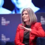 Republican senator Ernst faces boos in the contentious town hall